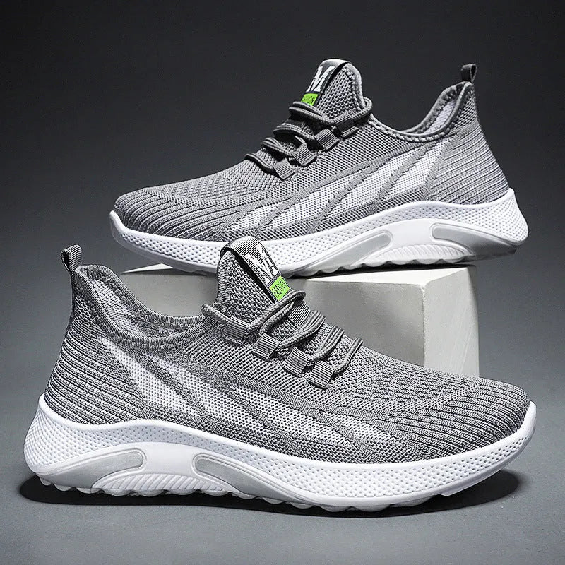 Men's casual running sneakers in black, mesh and PVC, solid colour, side view