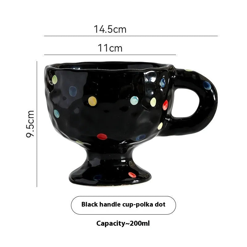 Hand-pinched irregular ceramic mug with solid colour design, approximately 14.5cm tall