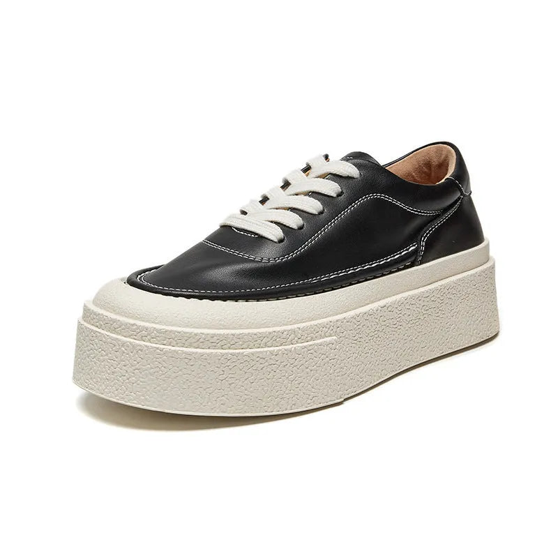 Women's black and white platform casual shoes with embossed cowhide leather and round toe design