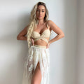 Three-piece push-up bikini set with backless top and matching skirt in polyester fabric