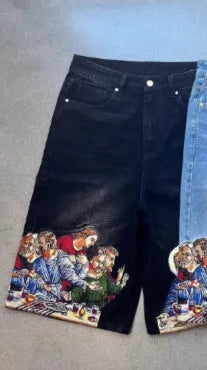 Blue men's cotton shorts with a Jesus design printed on the back pocket, showing tapered leg fit.