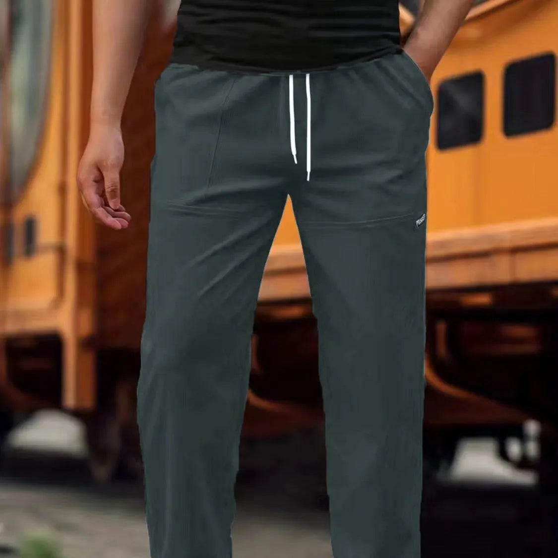Men's polyester trousers in multiple colours including light grey, dark green, black for spring and autumn wear
