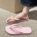 Men's closed-toe PVC flip flops in multiple colours on a plain background.