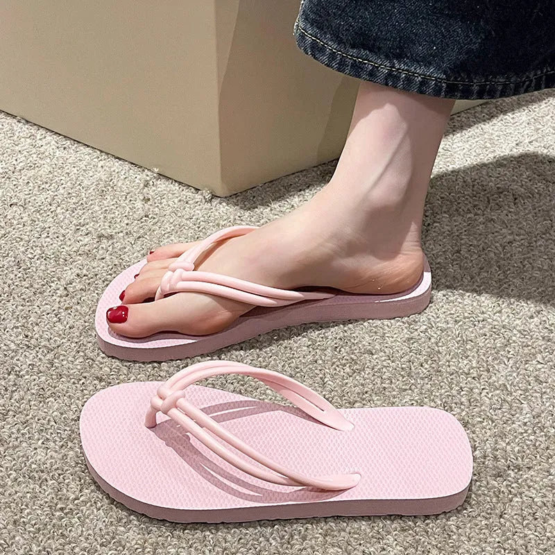 Men's closed-toe PVC flip flops in multiple colours on a plain background.