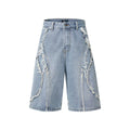 Distressed denim shorts with raw edge detailing in straight cut and cropped leg length