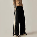 Black wide-leg climbing trousers with high waist design shown flat