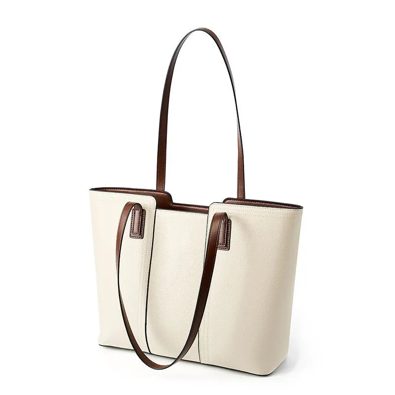 Women's genuine leather crossbody commuter bag in horizontal square shape with multiple internal compartments