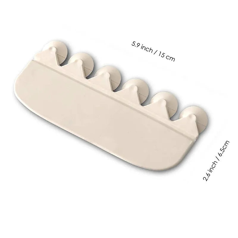 White PVC children's toilet training splash guard placed on a toilet seat.