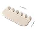 White PVC children's toilet training splash guard placed on a toilet seat.