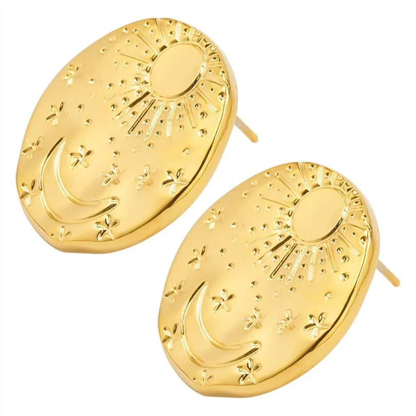 A pair of geometric shell design stud earrings in stainless steel with a gold or silver electroplated finish.
