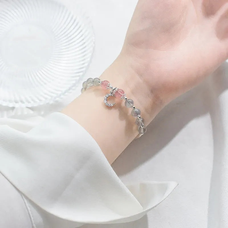 Natural moonstone adjustable bracelet with 6mm gemstone on wrist showing extension chain