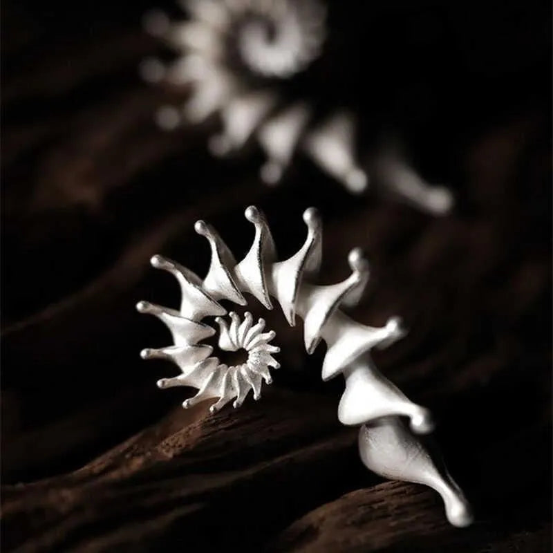 Exaggerated conch three-dimensional matte drop earrings in electroplated alloy metal