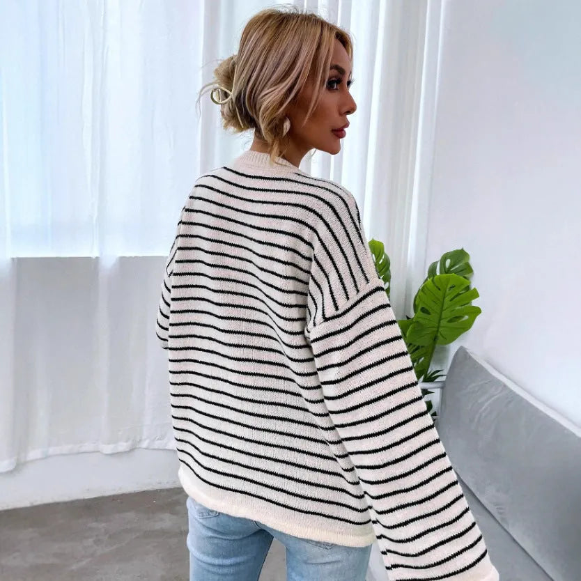 Black striped women's knitted top with drop-shoulder long sleeves and button details