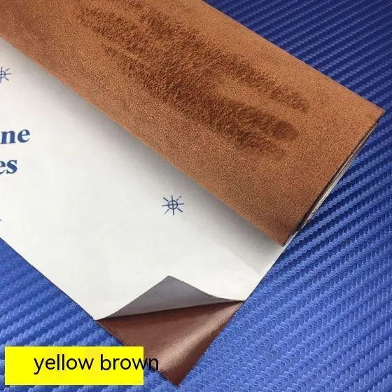 Sheet of self-adhesive elastic suede in beige colour, showing its thickness and adhesive backing.