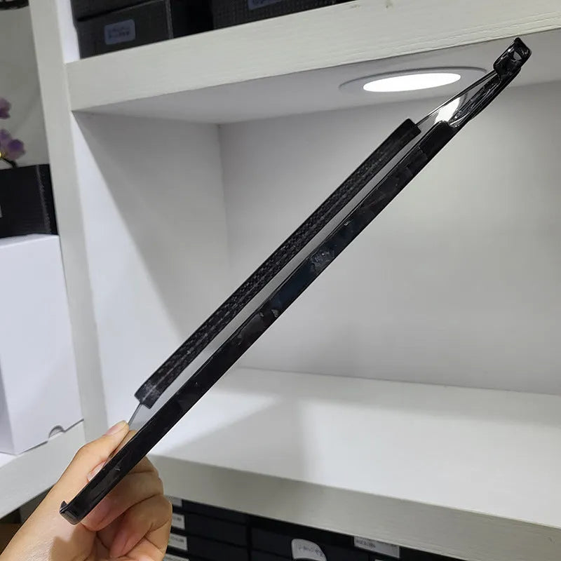 Carbon fibre hard protective case for Apple iPad Pro 11 showing embossed plaid pattern and choice of surface finishes.