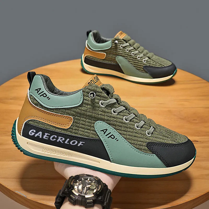 Men's grey and green mesh running shoes with round toe and lace-up front