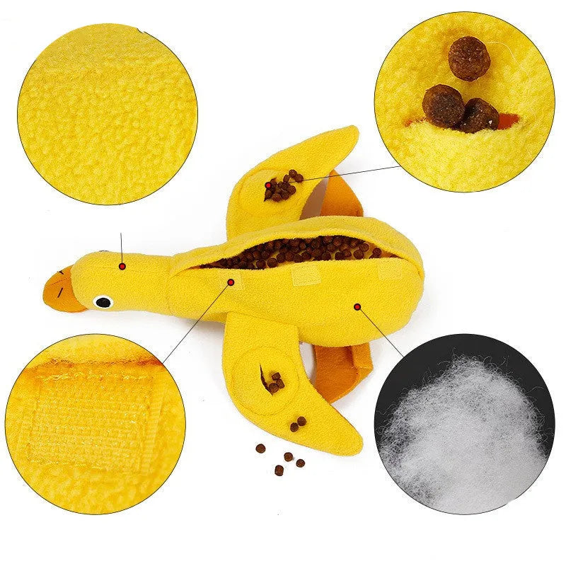 Yellow teddy dog toy with integrated duck doll, a pet training aid with sound and treat dispenser.