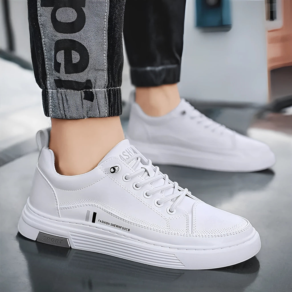 Men's low-top skateboard shoes with elastic band and microfiber upper in white or black