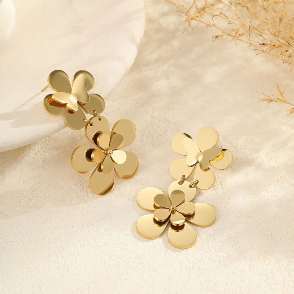 Gold flower butterfly stainless steel earrings with 18K electroplated finish and floral design elements