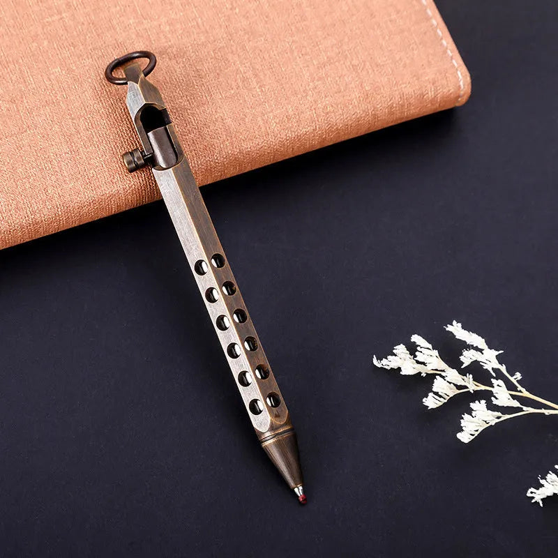 Brass hexagonal bolt pen showing six-sided barrel and bolt detailing with 0.5mm rollerball tip