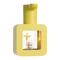 Yellow automatic soap dispenser with unicorn cartoon design and touchless sensor
