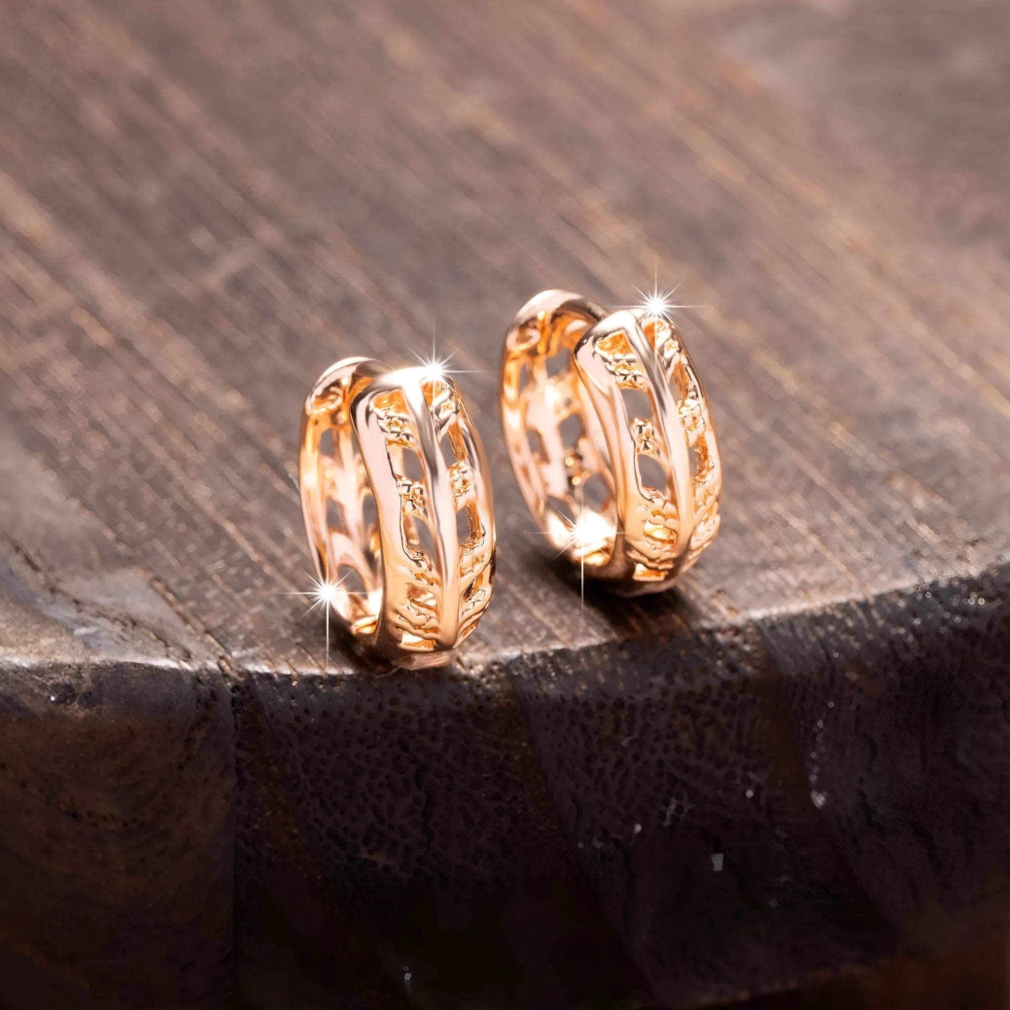 Copper rose gold hollowed-out leaf earrings with heart-shaped details