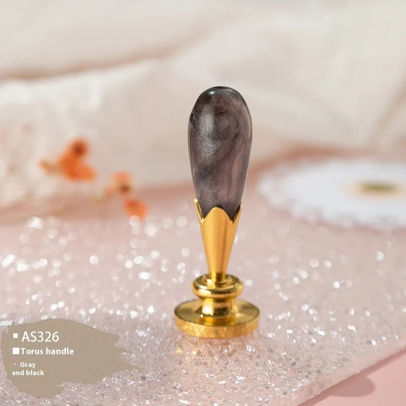 Wooden wax seal handle with decorative metal component in antique silver finish