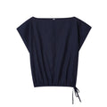 Women's linen blend co-ord suit with flounced sleeve top and wide leg trousers.