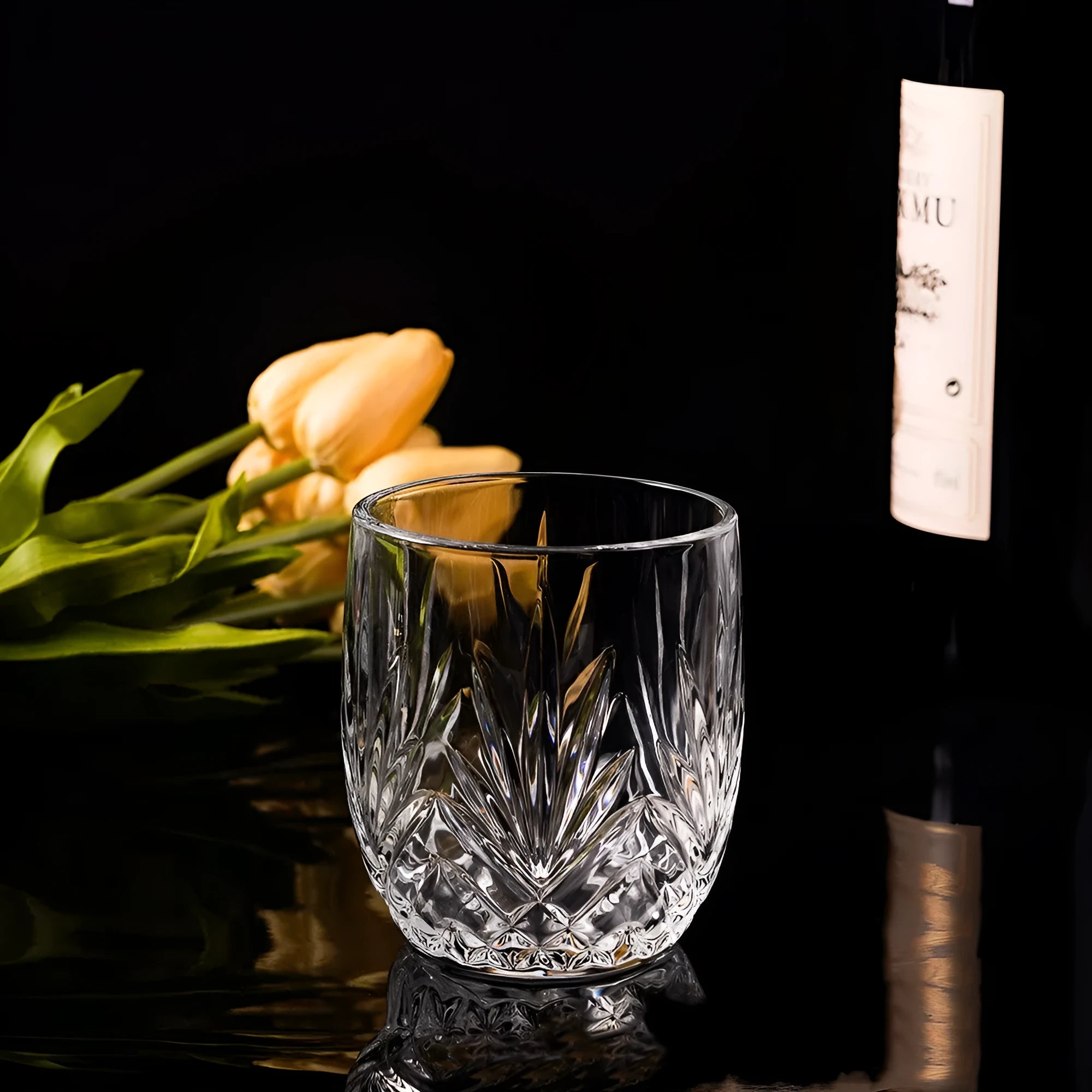 Clear thick-bottom whiskey shot glass with 301-400ml capacity on a table.