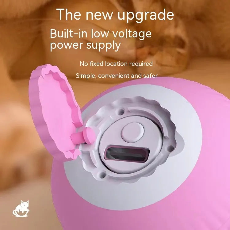 Blue silicone gravity rolling cat teasing ball on a light floor