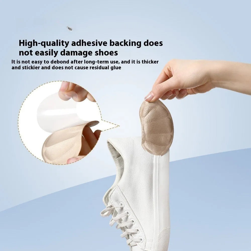 Three pairs of camel-coloured suede heel cushion pads for women's shoes on a white background.