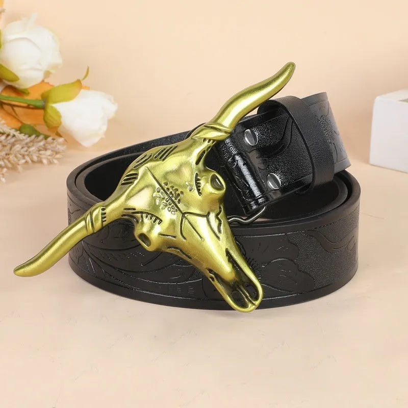 Men's black imitation leather belt with a detailed silver alloy cow head buckle and pin buckle fastening.