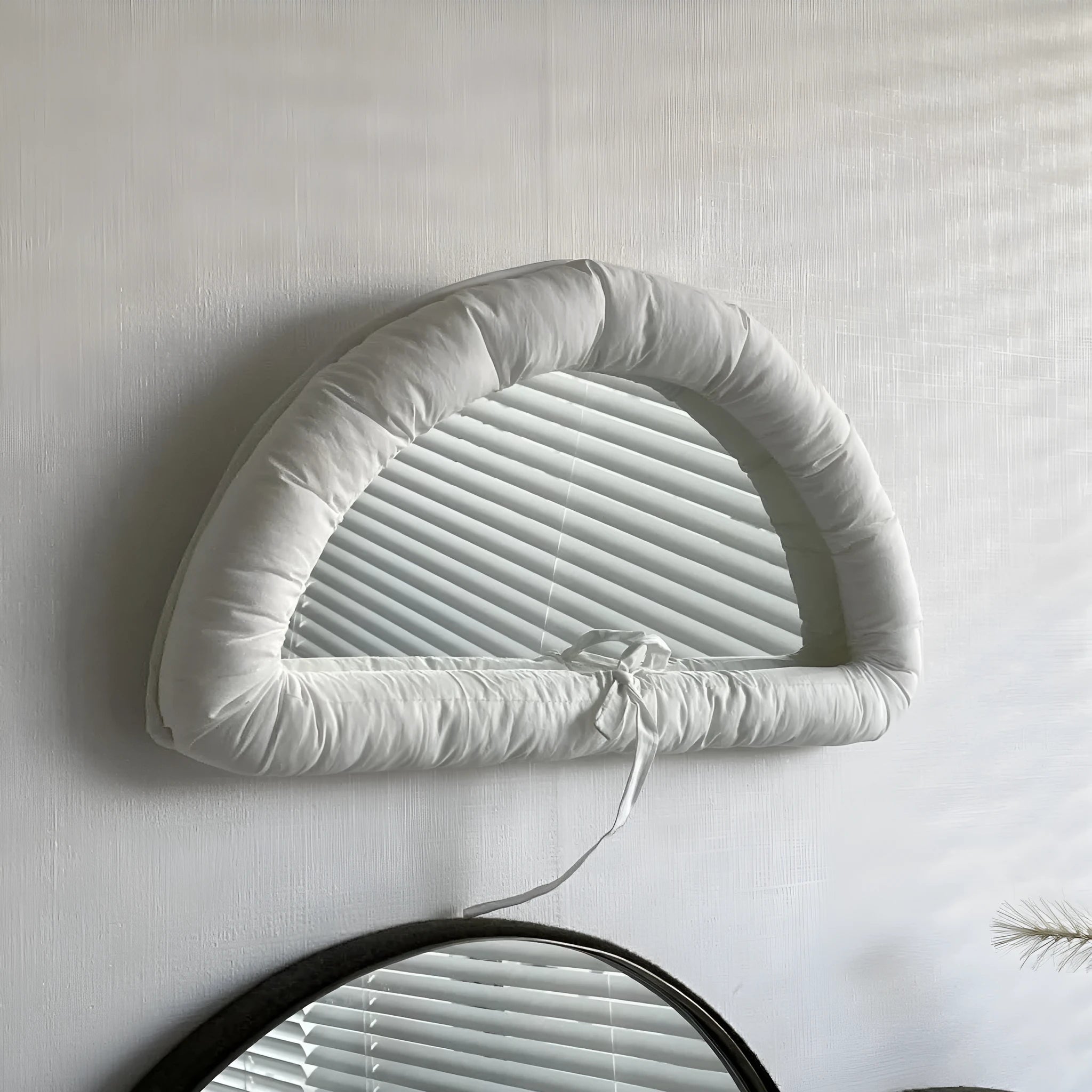 Soft cotton-filled fabric mirror in black, white or sapphire blue colour measuring 23x40cm