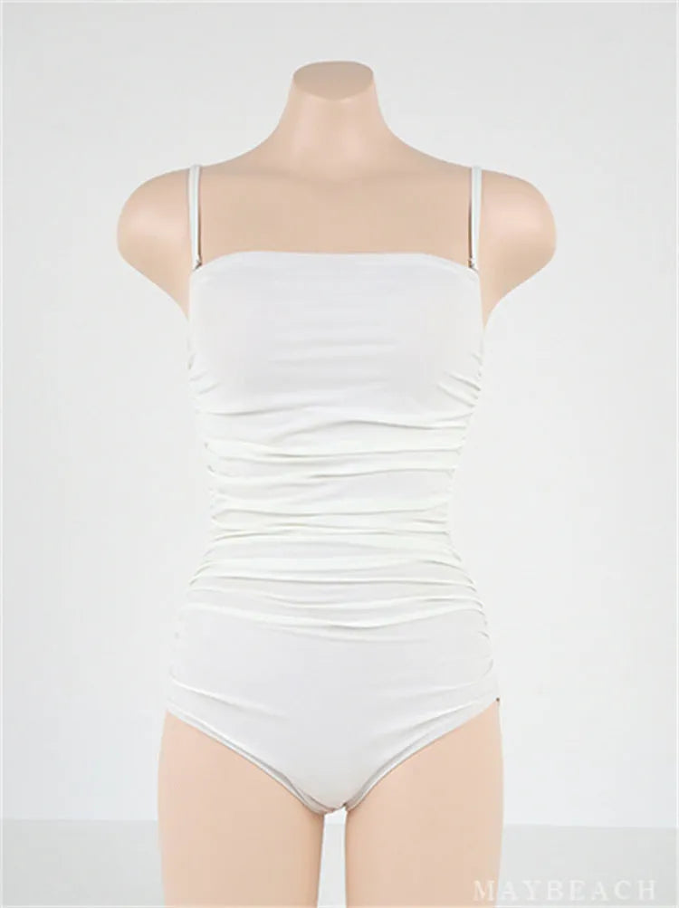 Sling style belly pleated one-piece swimsuit in slim fit available in blue, white, yellow, black colours