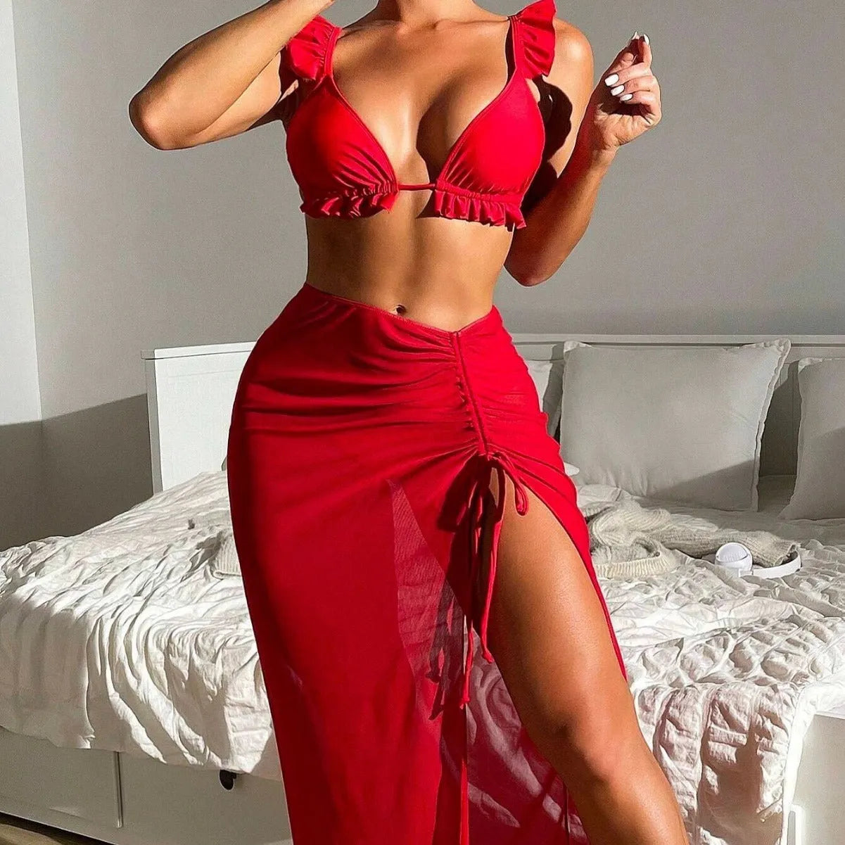 Women's printed three-piece bikini set with a cover-up skirt in various colours