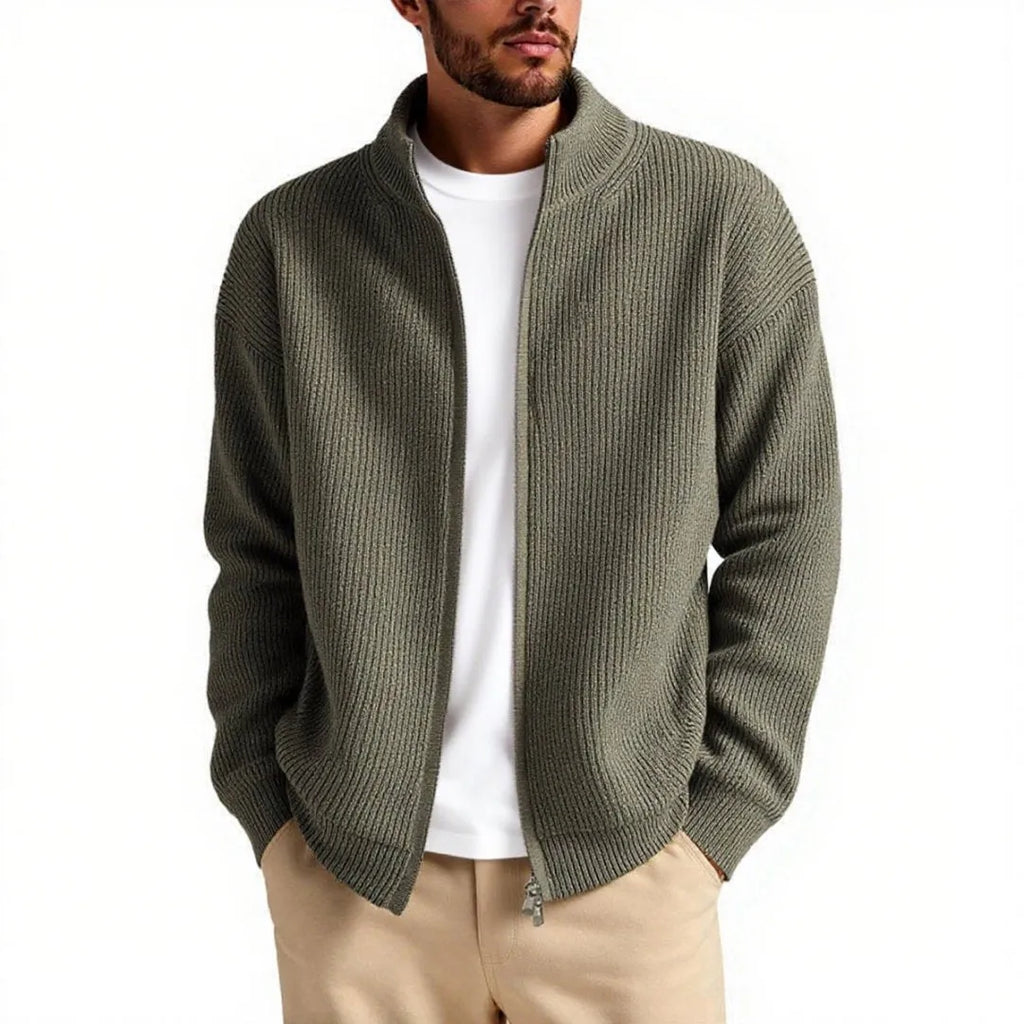 Man wearing a loose-fit grey cardigan sweater coat for casual leisure wear.