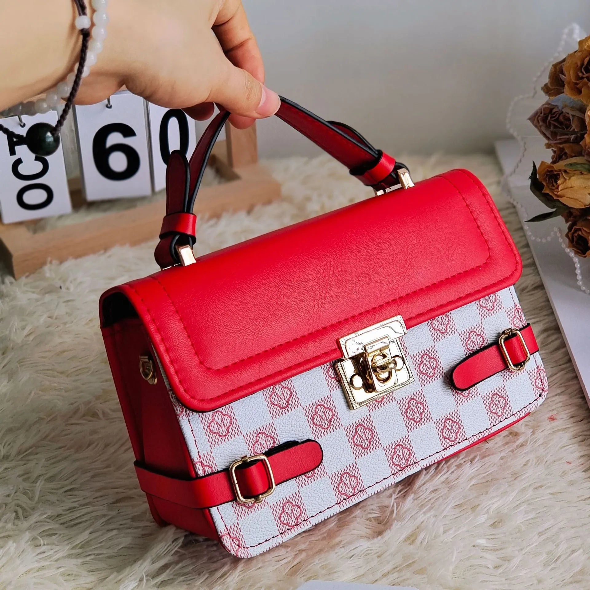 Retro-style square crossbody bag with floral stitching and a diamond pattern in PU leather.