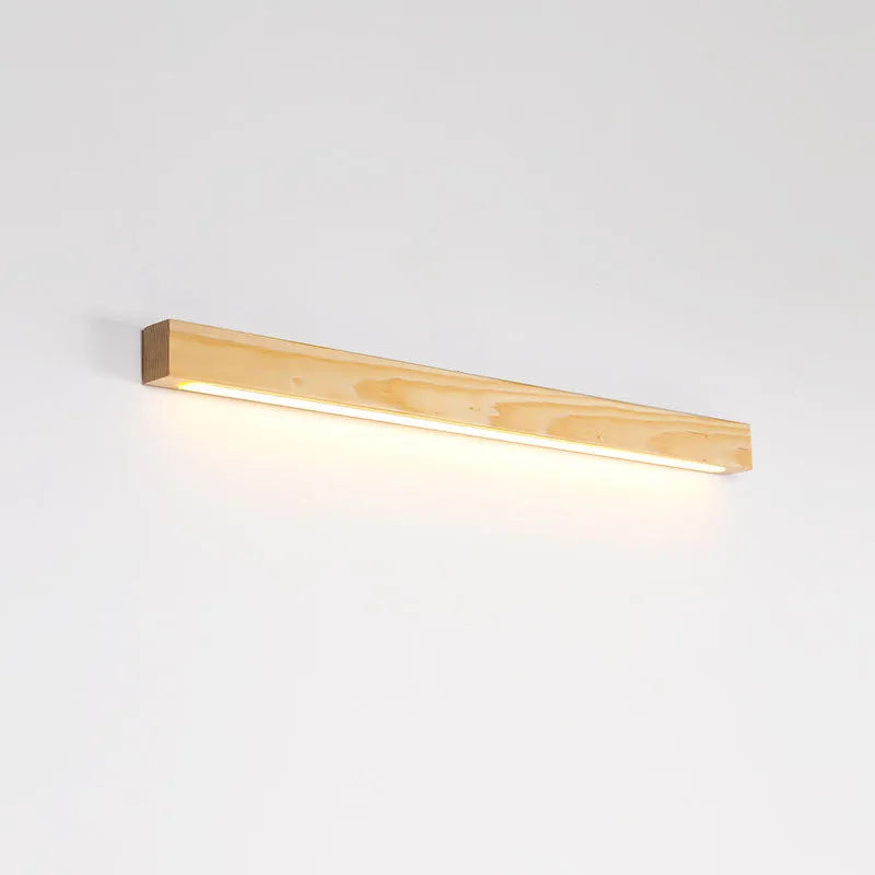 Walnut coloured linear wood and acrylic LED strip wall lamp mounted on a wall.