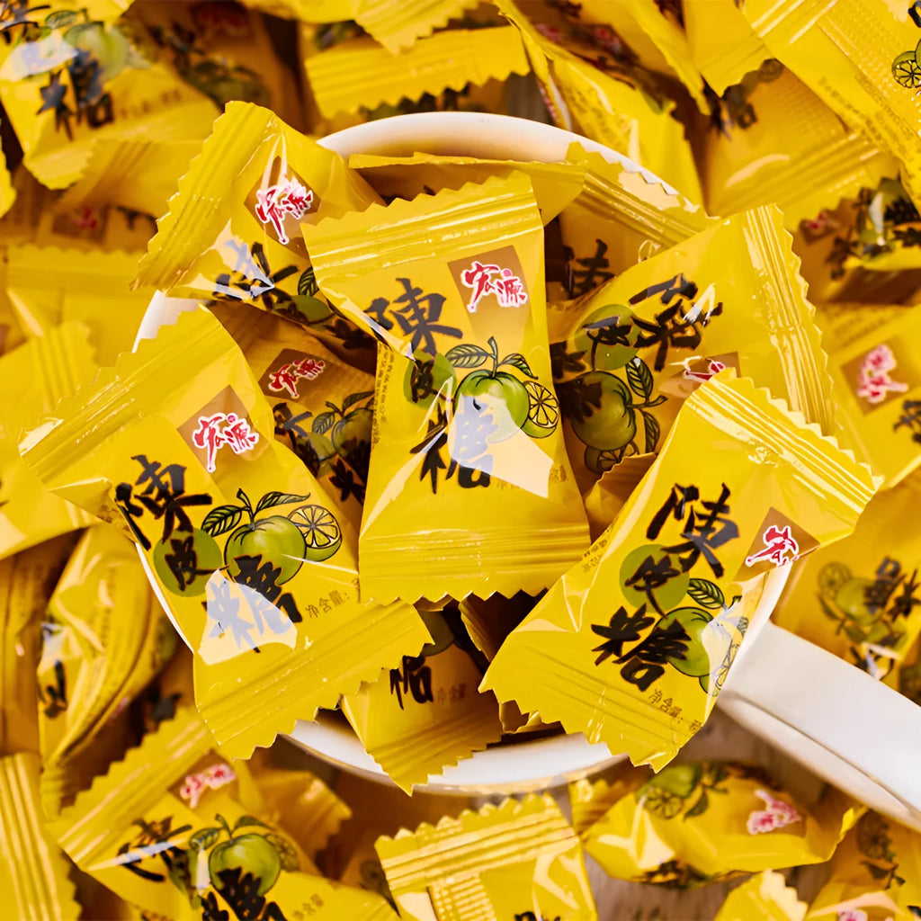 Three bags of hard candy: guava flavour (350g), plum sugar (350g), and tangerine peel (355g).