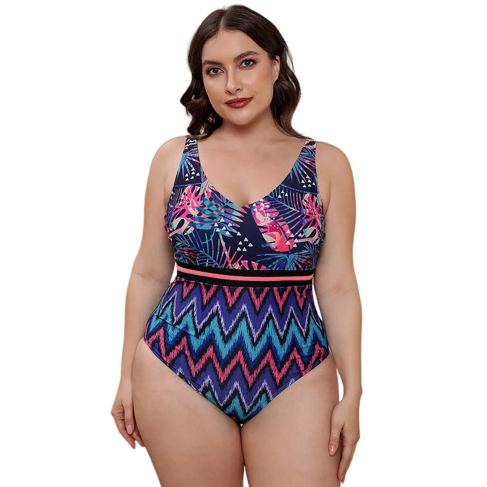 Blue striped one-piece swimsuit with spaghetti straps for women on a mannequin.