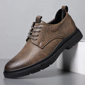 Men's black and brown leather sneakers with cowhide uppers and rubber soles