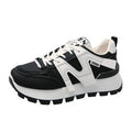 Low-top lace-up sneakers with artificial PU upper and rubber sole in black or white colour