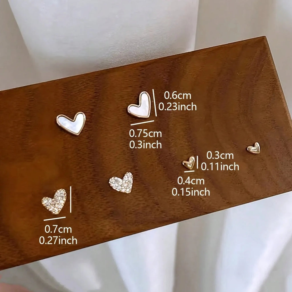Three pairs of heart-shaped electroplated alloy earrings in girly style with love elements