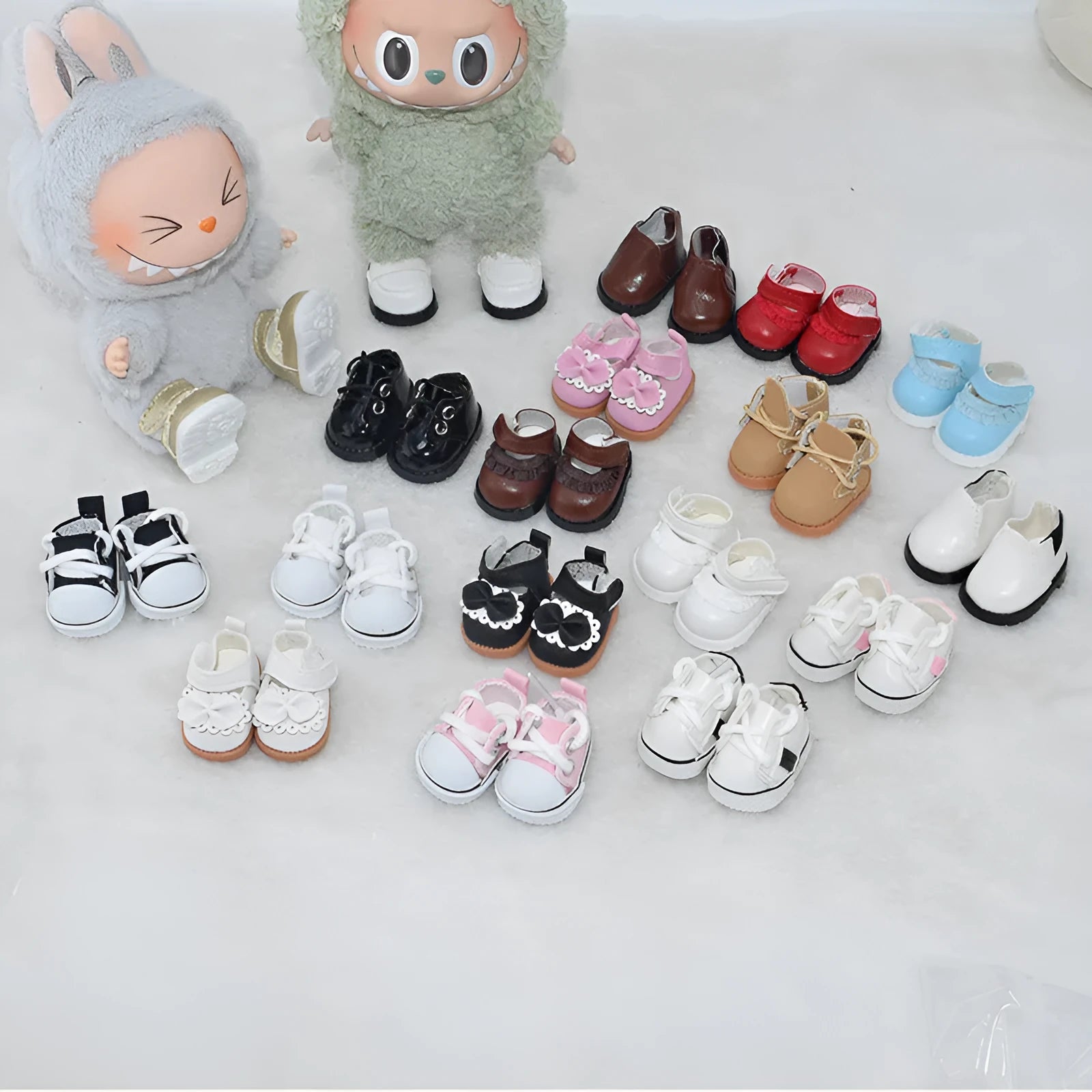 Set of miniature doll replacement shoes in various styles and colours for 17cm scale figures.