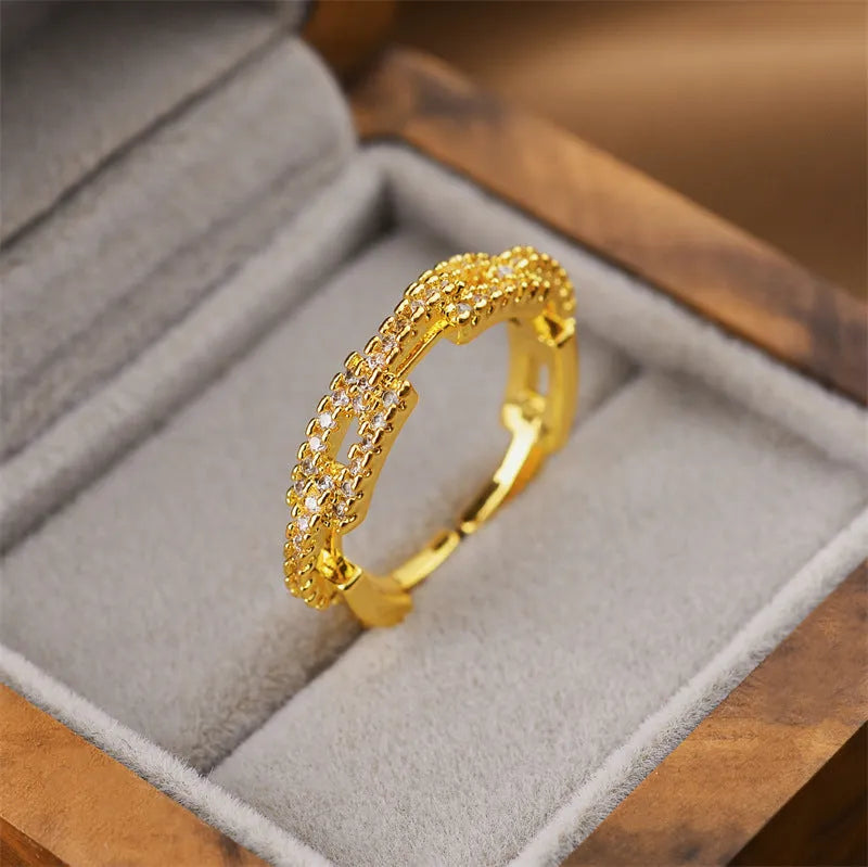Korean women's adjustable open geometric ring with gold electroplated finish on copper