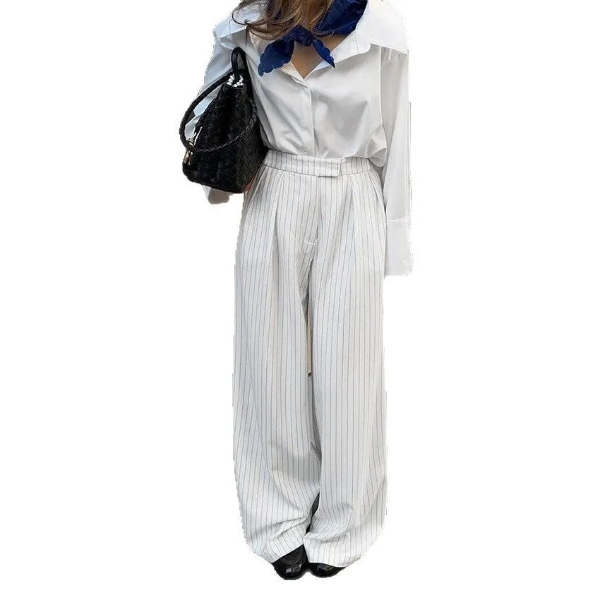 White striped wide-leg commuting trousers with front zipper detail and loose fit