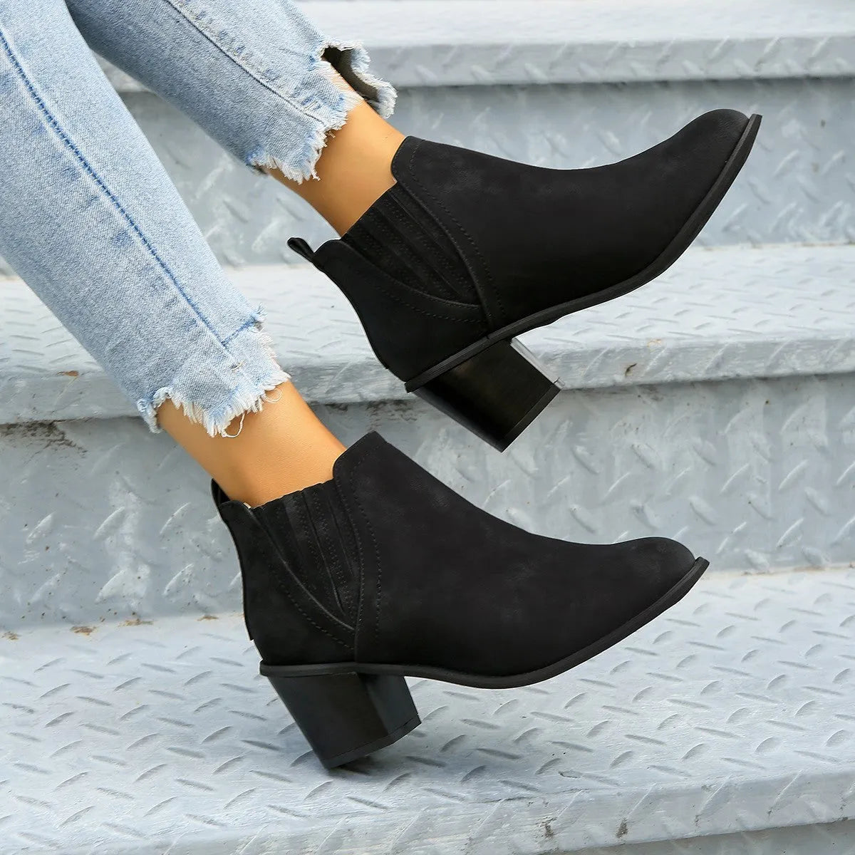 Women's black slip-on ankle boots with pointed toe and thick square heel for autumn winter wear