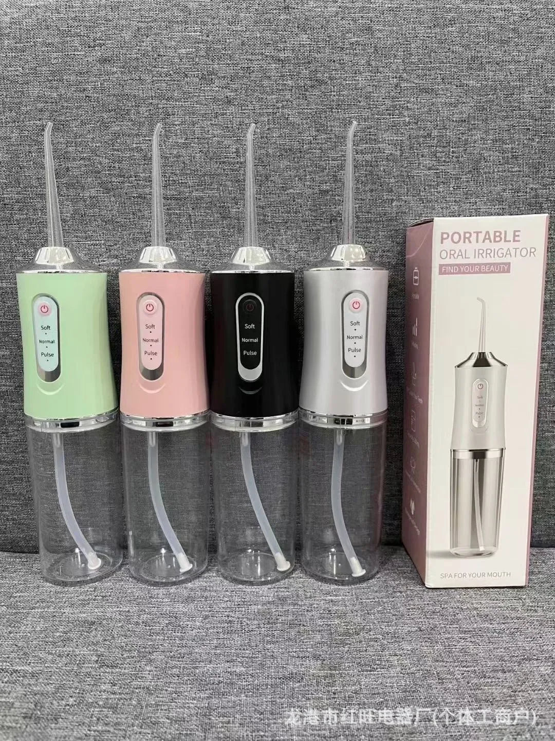 Pink electric water flosser with 300ml tank, multiple nozzles, and IPX7 waterproof design