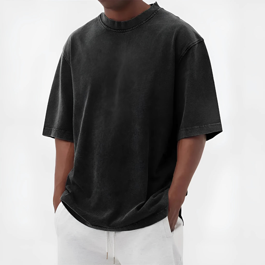 Men's loose fit distressed stone wash pullover t-shirt in solid colours like army green and blue.