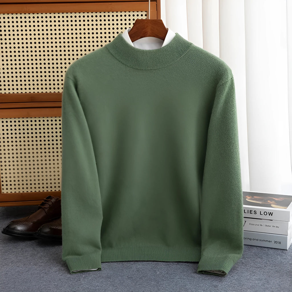 Man wearing a loose-fit half-collar wool sweater in a textured knit, shown in one of the available colours like camel or dark grey.